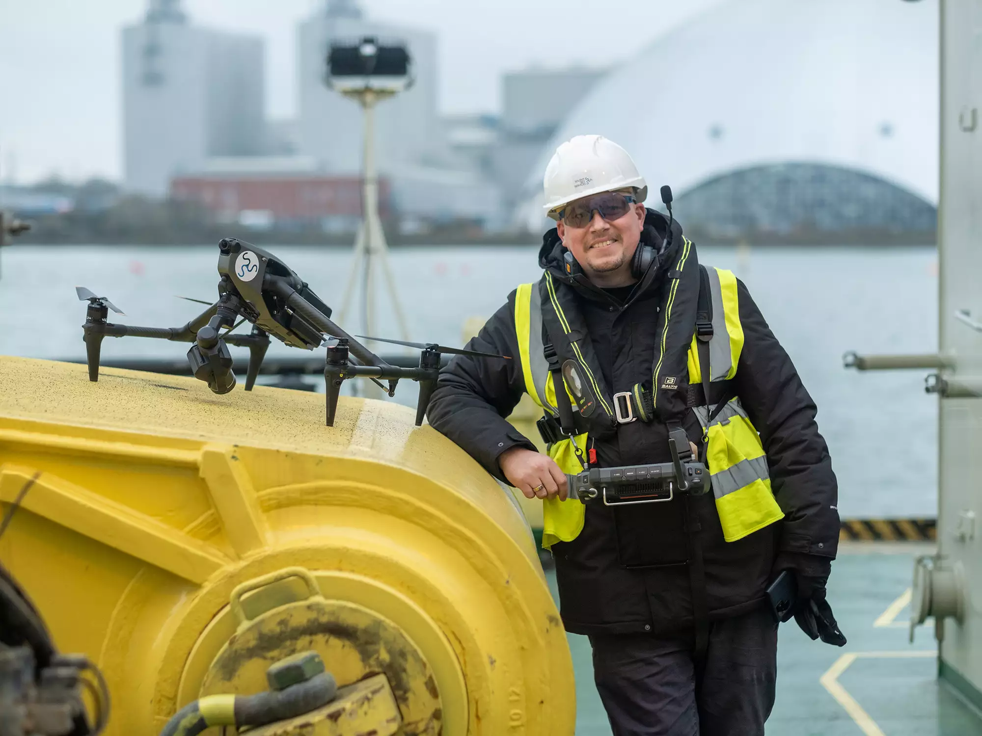 Drone operator with a drone aboard a vessel in Southampton